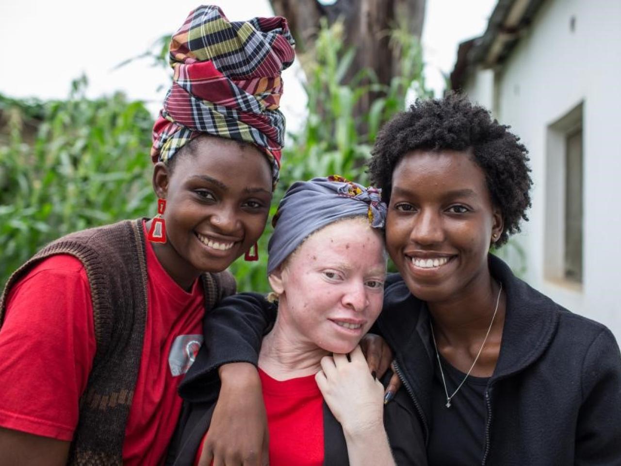 three women smiling