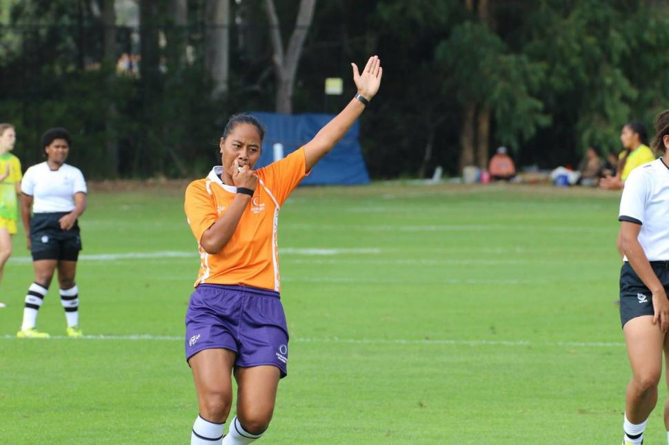 Avi'i Fa'alupega blows the whistle at a women's rugby match