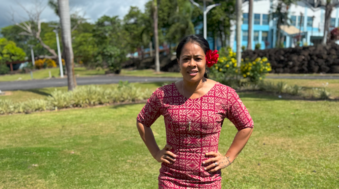 Gabrielle Apelu stands outside with hands on hips