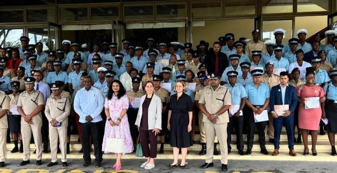 Minister of Human Services and Social Security, Dr. Vindhya Persaud; Minister of Home Affairs, Robeson Benn; Commissioner of Police (ag), Clifton Hicken; UN Resident Coordinator in Guyana Yeşim Oruç; graduates and other officials (DPI photo)
