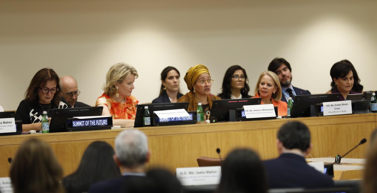Panel of women look at audience