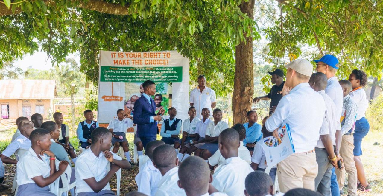 A student from Bujubuli Secondary School sharing about the GBV club with partners during the Team Europe Tour to Kyaka II Refugee Settlement Photo: © UN Uganda