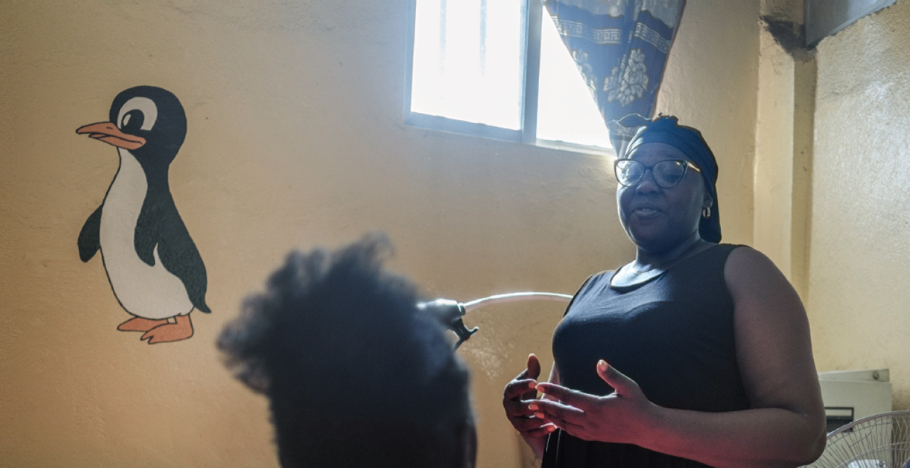 Tow women speaking in an office setting