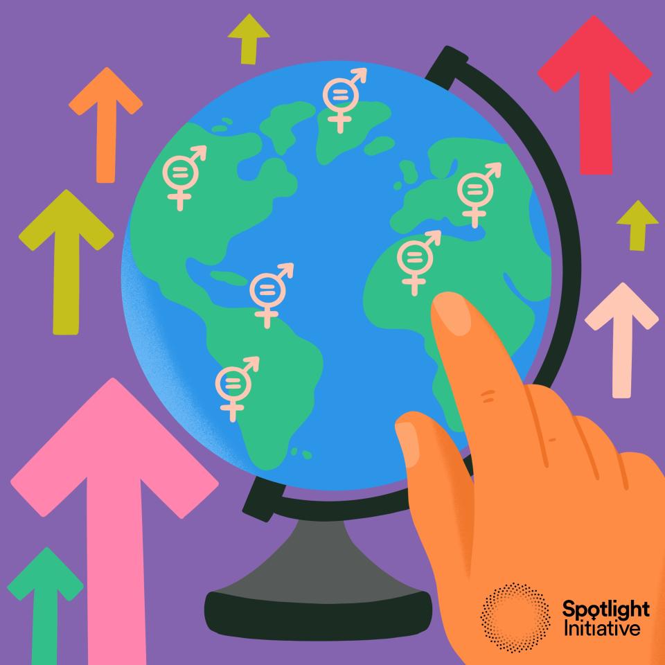 A finger point to a globe with gender equal signs