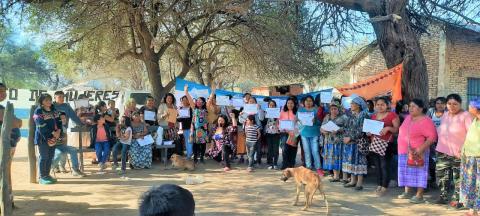 Women and girls from the Wichí Indigenous communities of El Carboncito in Salta Province pose with their certificates of completion from the trainings sponsored by the Spotlight Initiative.